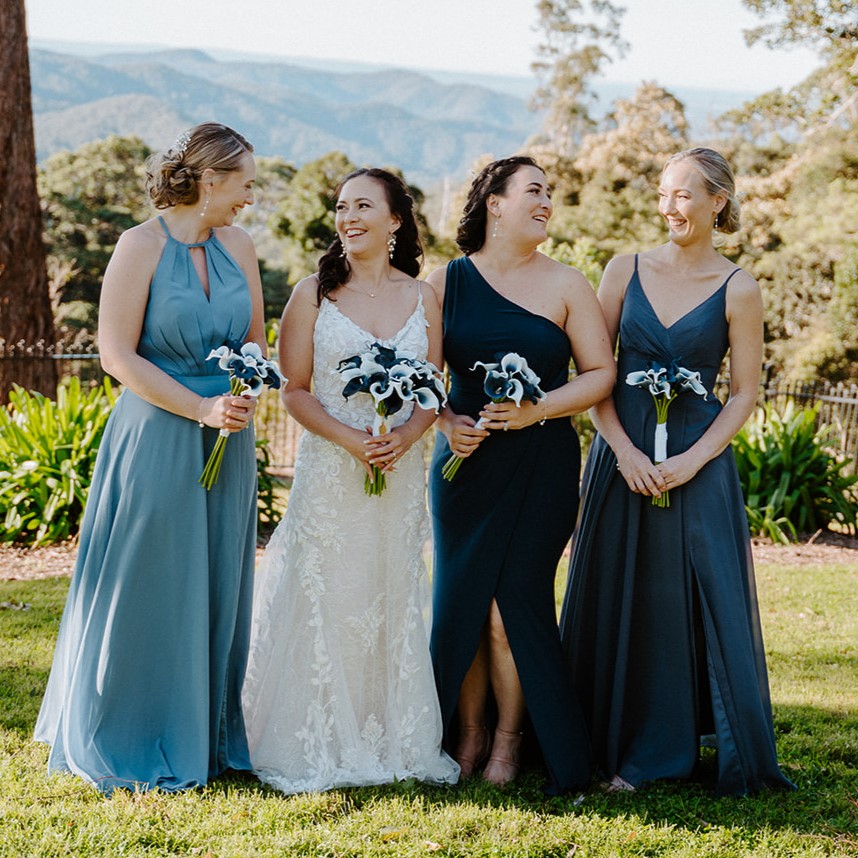 Bridesmaids in blue with matching hair and makeup, Gold Coast wedding